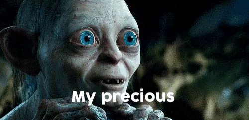 Gollum personagem do filme Senhor dos Anéis e abaixo dele a palavra My Precious (Meu precioso)